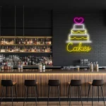 neon sign cake with heart topper and bakery decor 1