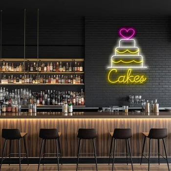 neon sign cake with heart topper and bakery decor 2