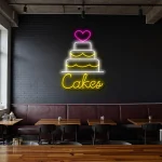 neon sign cake with heart topper and bakery decor 1