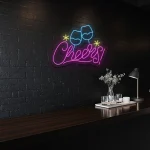neon sign cheers text with clinking glasses bar decor 1