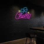 neon sign cheers text with clinking glasses bar decor 1