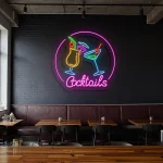 neon sign cocktails bar decor with colorful drink glasses 1