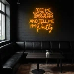 neon sign feed me tacos text purple wall decor 1
