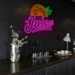 neon sign juice text with orange slice and leaf fruit decor 1