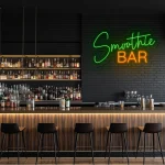neon sign smoothie bar green and orange wall decor 1