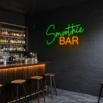 neon sign smoothie bar green and orange wall decor 1