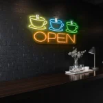 neon sign coffee cups and open text coffee shop decor 1